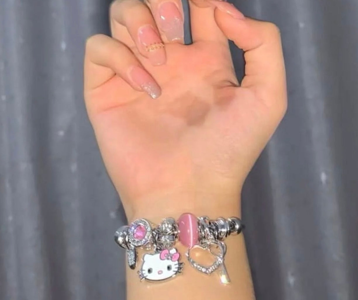 Lovely Hello Kitty Charm Bracelet - Free Shipping to N.A. - Puddle